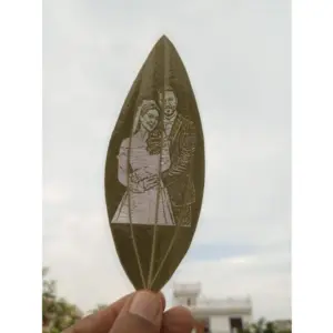 Custom Engraved Leaf Art – Couple Portrait on Natural Leaf